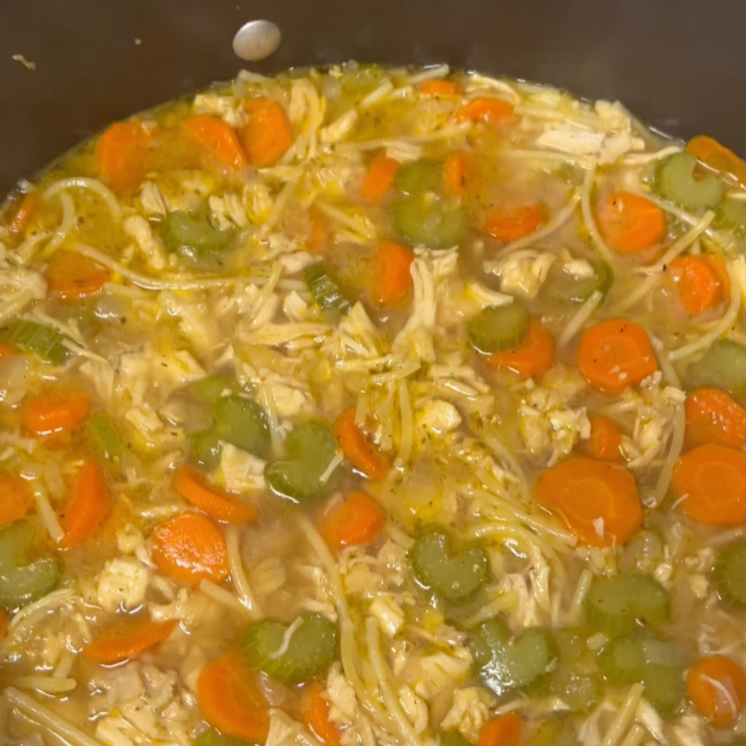 Pampered Chef Minestrone Soup Mix packet beside a bowl of fresh soup - gluten-free pantry essential.