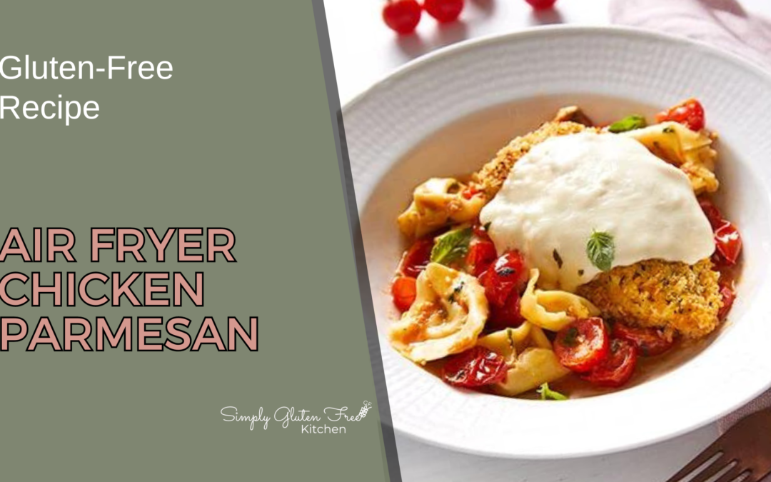 A plate of Gluten-Free Air Fryer Chicken Parmesan, featuring a crispy chicken breast topped with melted mozzarella cheese, served alongside cherry tomatoes and cheese-filled tortellini, garnished with fresh basil.