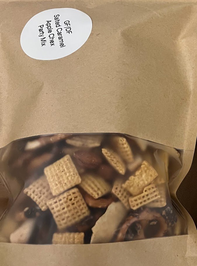 Salted Caramel Apple Chex Party Mix 1 Gluten-free Salted Caramel Apple Chex Party Mix with pretzels, chocolate chips, apple crisps, and almonds.